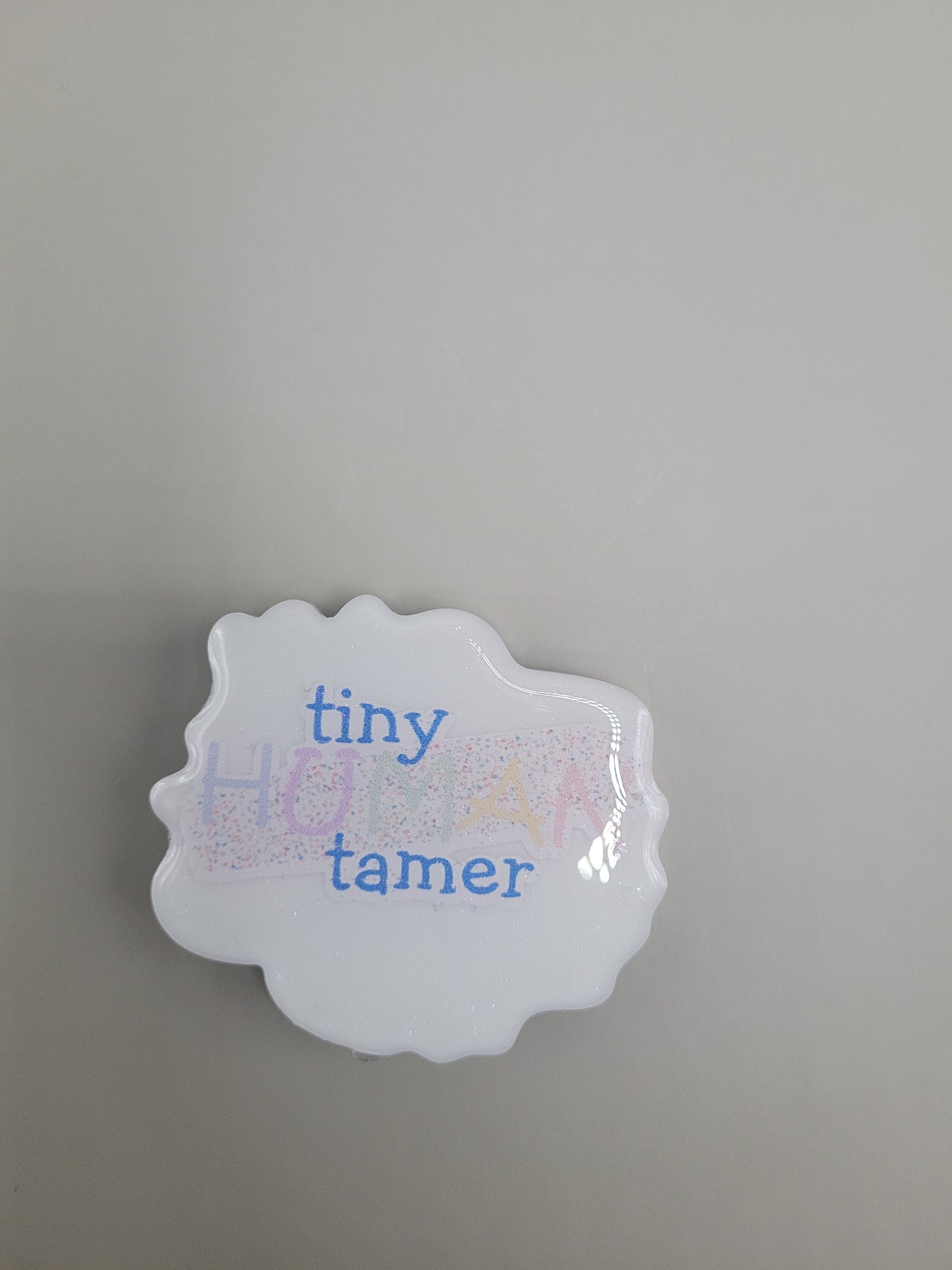 Tiny Human Tamer Badge Face